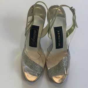 Size 6 Nordstrom Amano clear peep toe silver heels excellent condition.